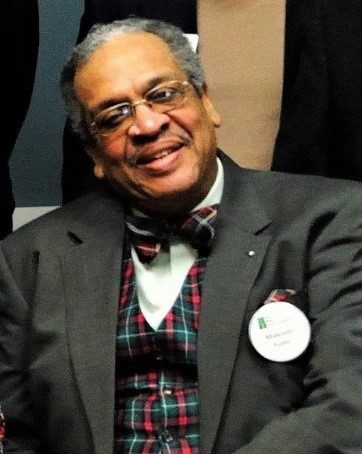 Malcolm was known for his bow ties.